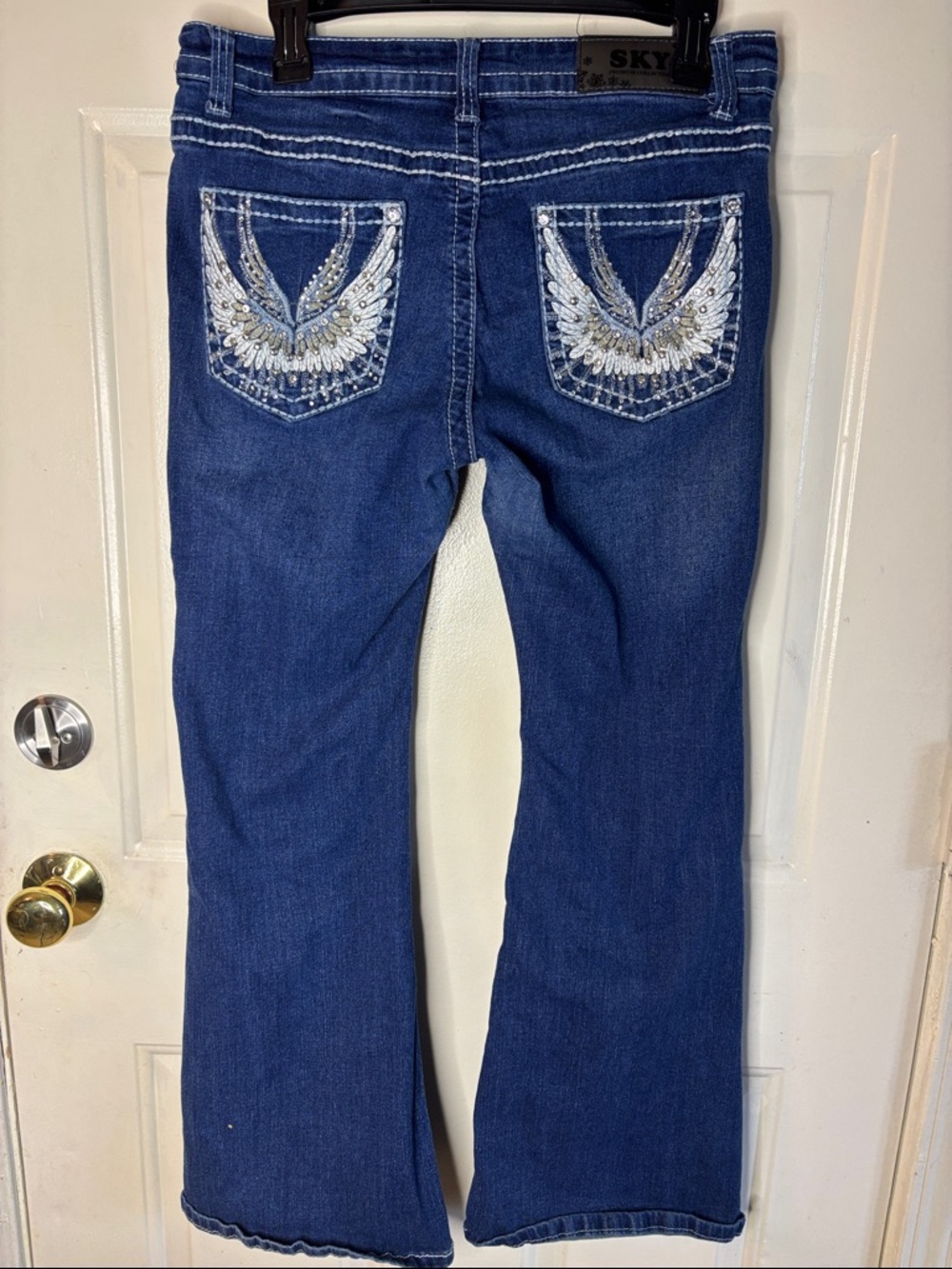 Sky Dark Blue Flare Jeans with Embellished Wing Pockets